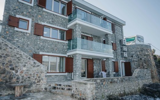 For sale seafront stone house with three apartments in Krasici