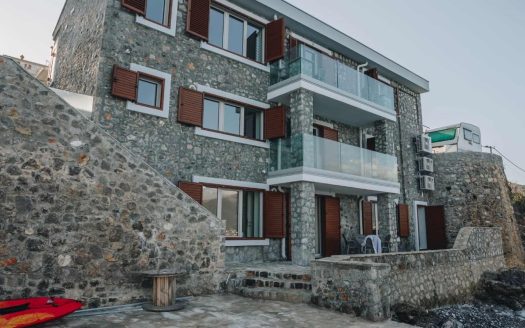 For sale seafront stone house with three apartments in Krasici
